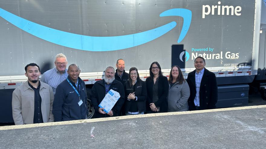 group of UCSF staff standing in front of amazon prime truck