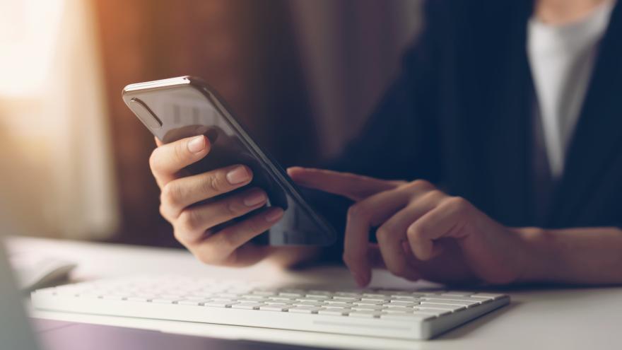woman using smartphone