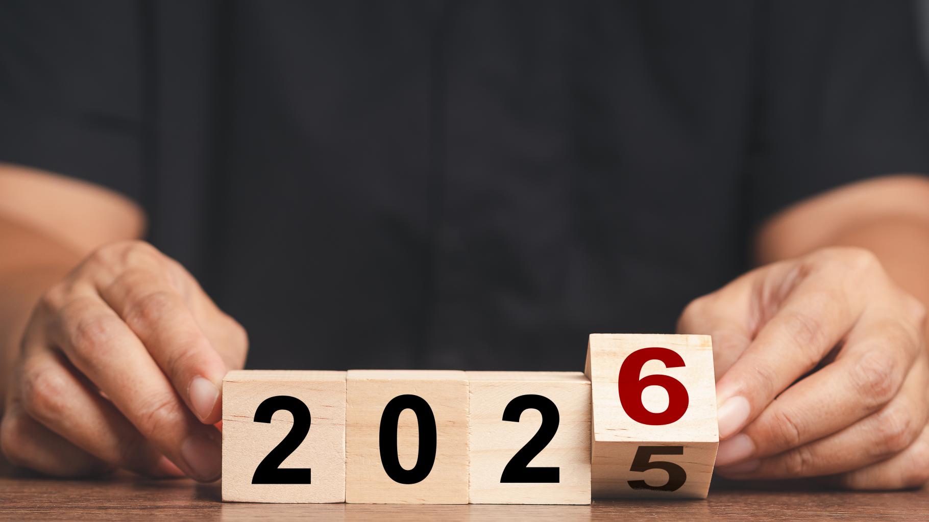 Flipping of 2025 to 2026 on wooden cubes for preparation of new year change