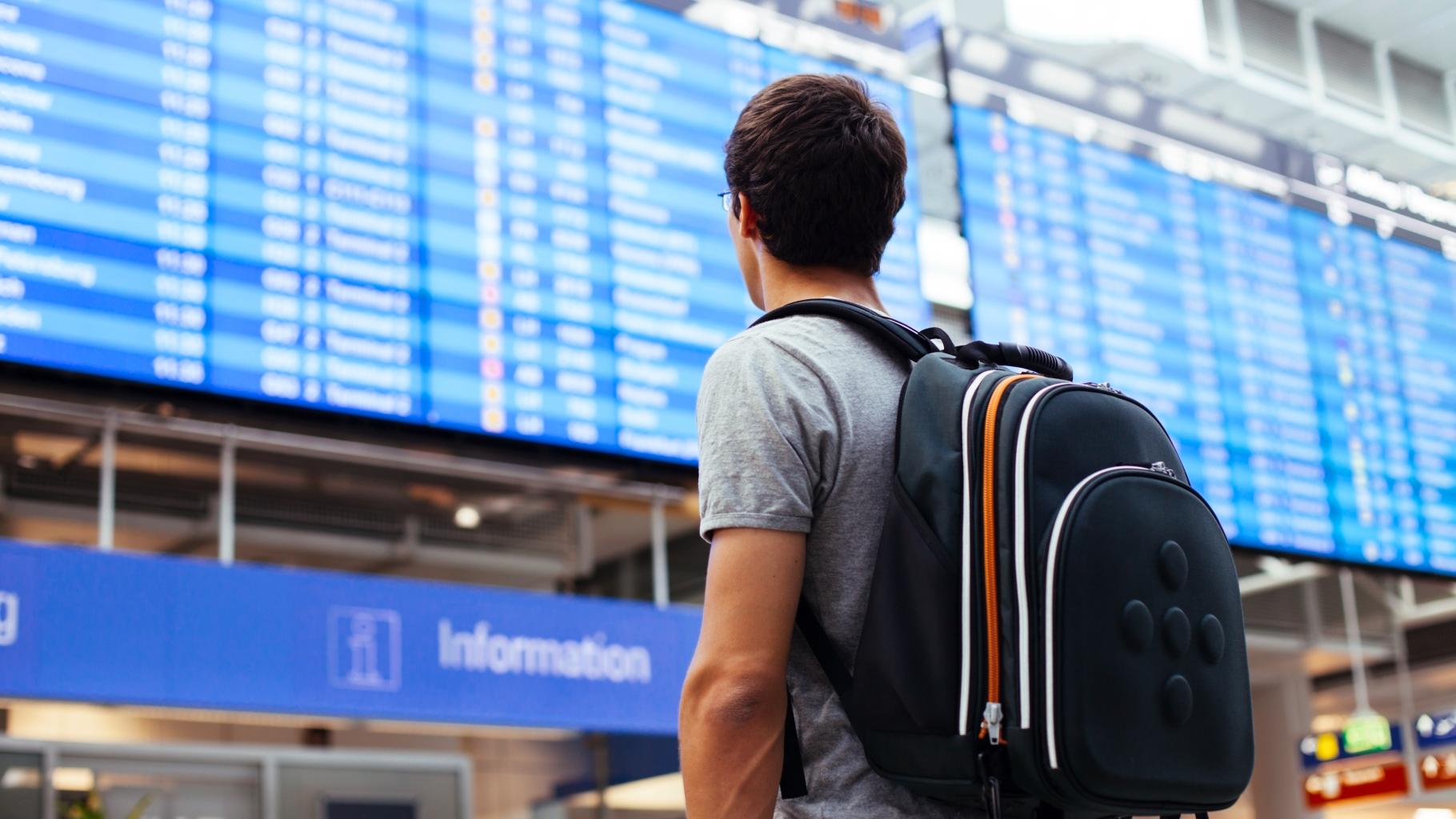 guy_near_airline_schedule
