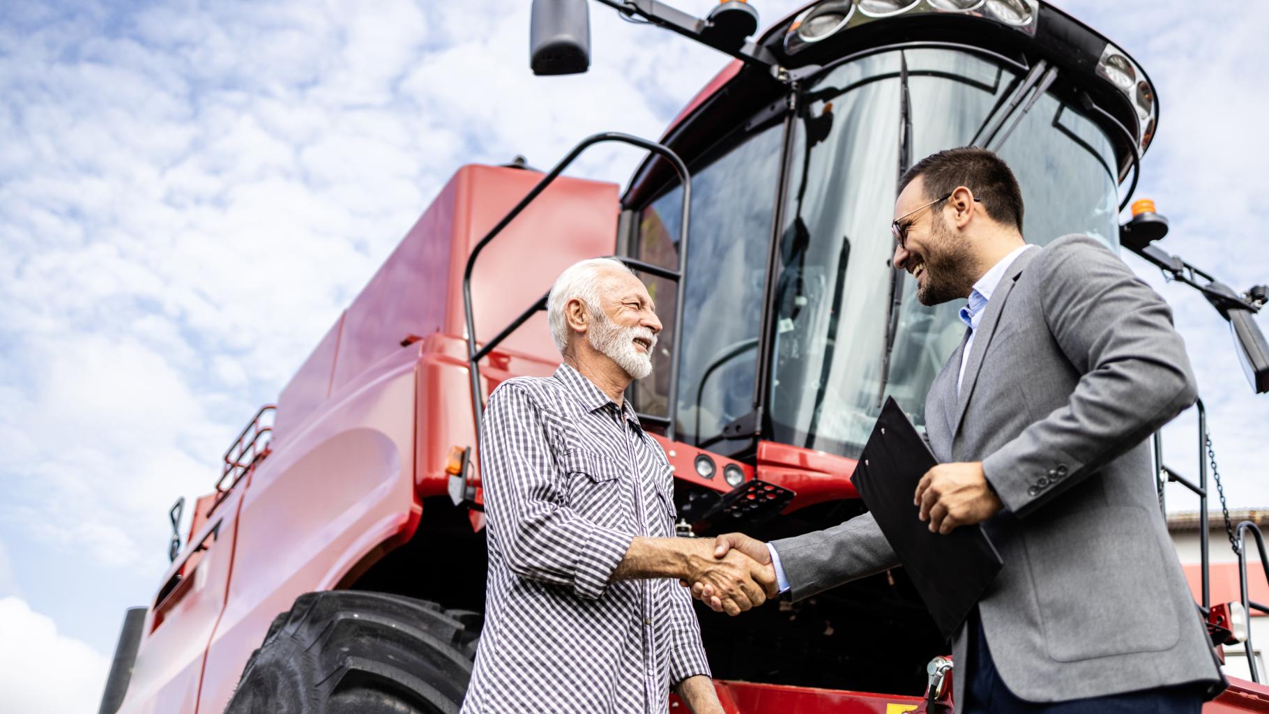 Investing in agricultural machines. Buying new combine harvester machine.