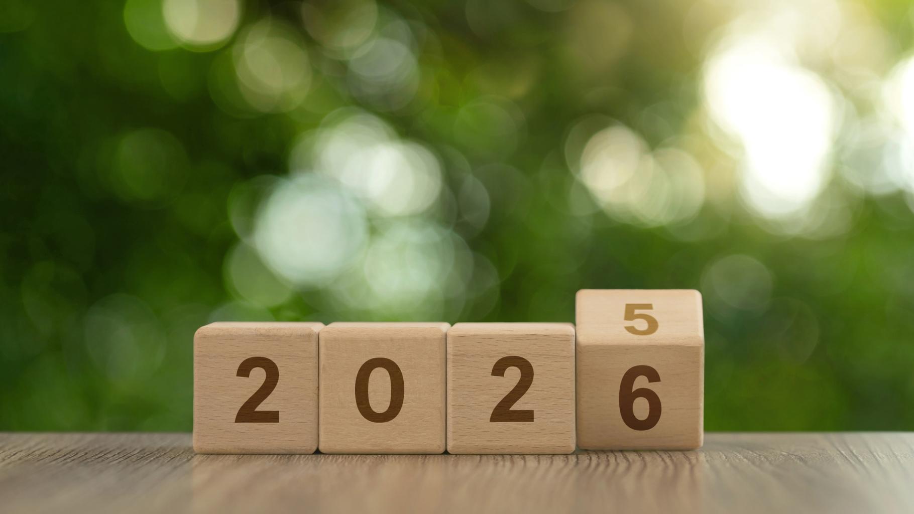 Wooden cube blocks flipping from 2025 to 2026